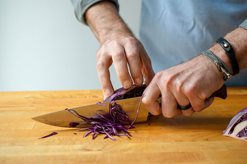 cutting cabbage with a chef knife
