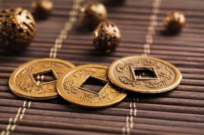 feng shui coins on a table